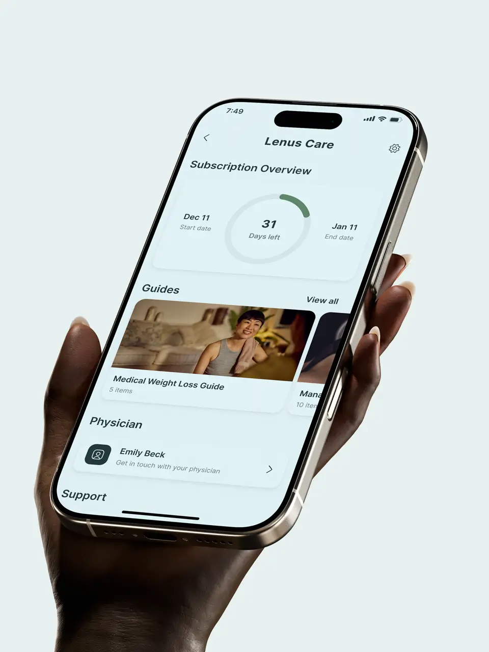 Hand holding mobile device showing fitness care feature